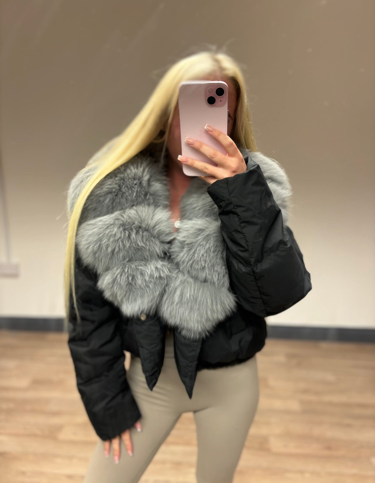 Black & grey fur coat in stock