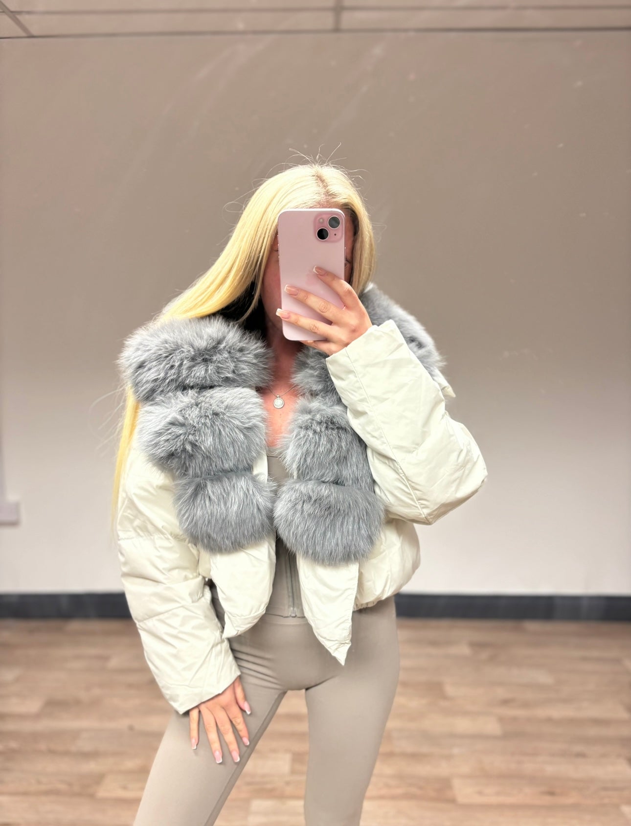 Cream & Grey fur coat in stock